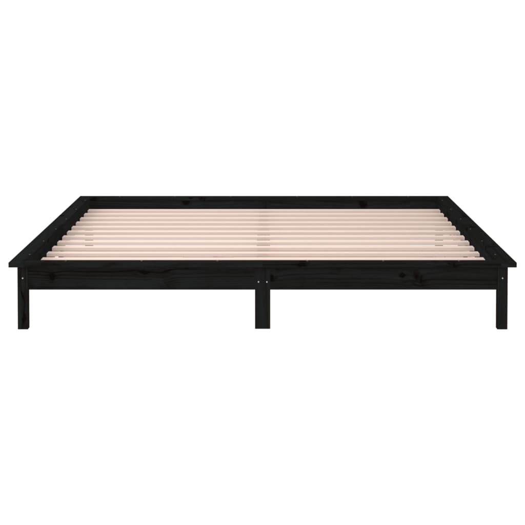 Estrutura de cama c/ LED 140x190 cm madeira maciça preto