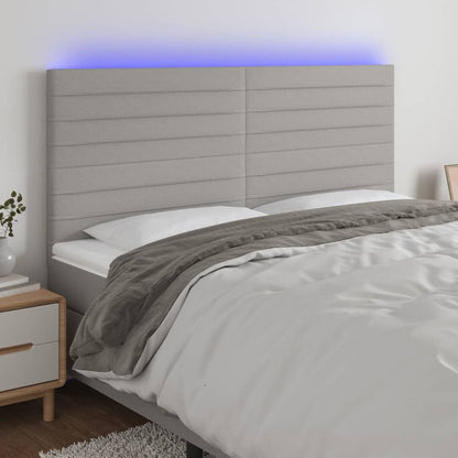 Cabeceira de cama c/ LED tecido 160x5x118/128 cm cinza-claro