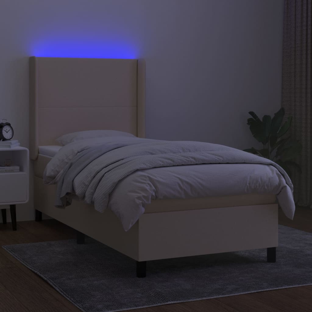 Cama box spring c/ colchão e LED 90x190 cm tecido cor creme