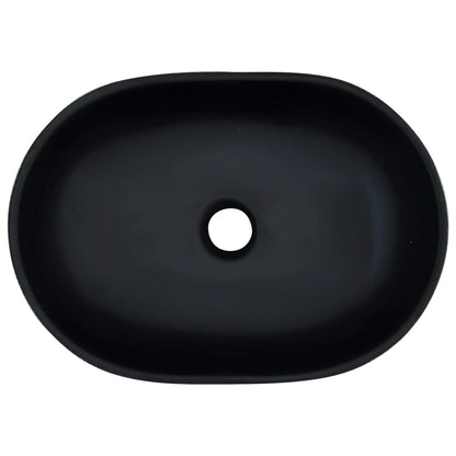 Lavatório de bancada oval 47x33x13 cm cerâmica preto e cinza