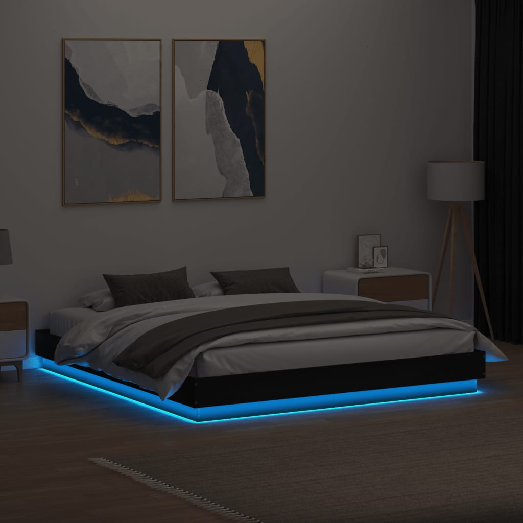 Estrutura de cama com luzes LED 180x200 cm preto