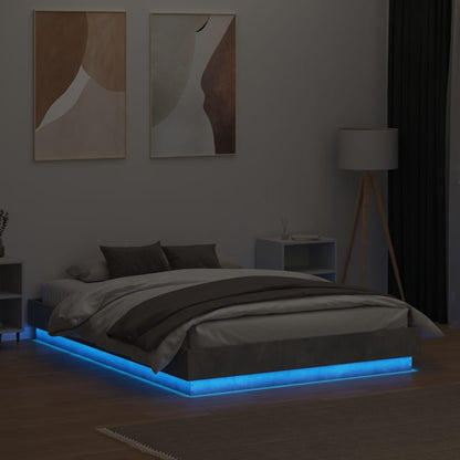 Estrutura de cama com luzes LED 135x190 cm cinzento cimento