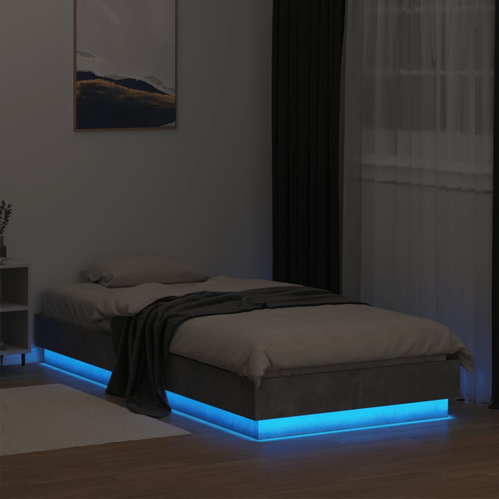 Estrutura de cama com luzes LED 90x200 cm cinzento cimento