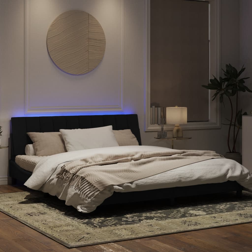 Estrutura de cama com luzes LED 180x200 cm veludo preto