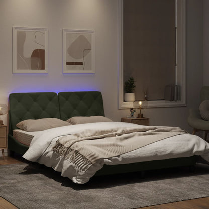 Estrutura de cama c/ luzes LED 140x190 cm veludo cinzento-claro