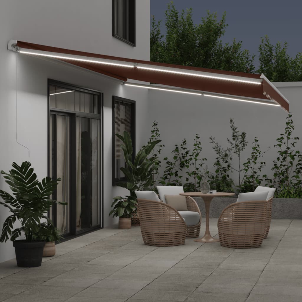 Toldo retrátil manual com luz LED 600x300 cm castanho