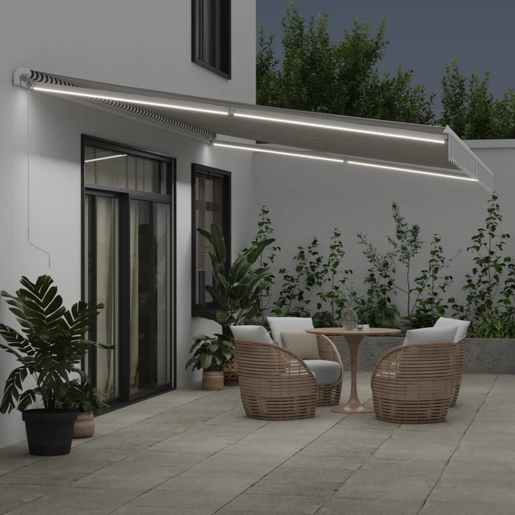 Toldo retrátil manual com LED 600x350 cm antracite/branco