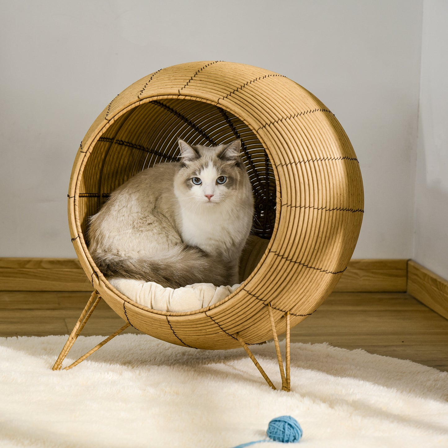 PawHut Cama de Vime para Gatos Caverna de Vime para Gatos Pequenos com Almofada Acolchoada Suave e Base Tripé Desenho Elevado Ø52x58cm Marrom Claro