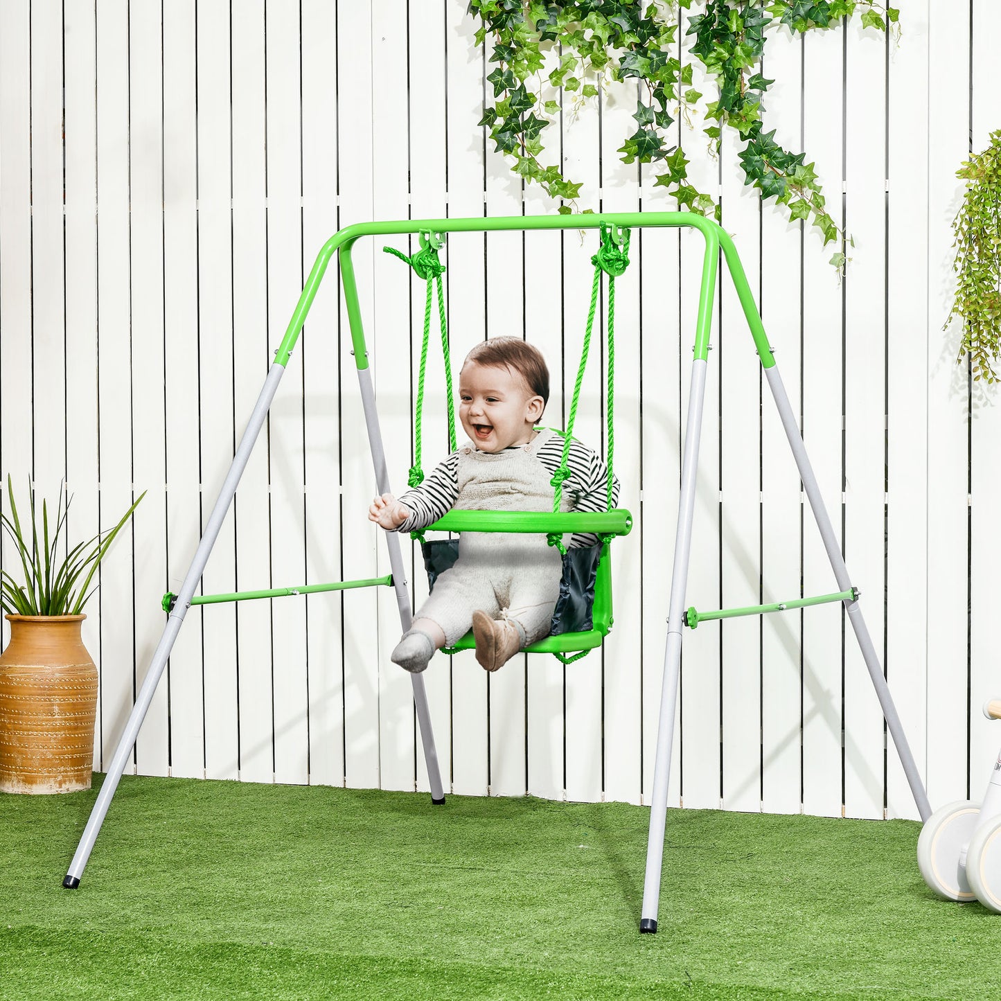 Outsunny Baloiço Infantil de Aço Baloiço para Crianças de 6-36 Meses com Encosto Alto e Arnês de Segurança para Interior e Exterior Carga Máxima 25 kg 122x146x122 cm Verde