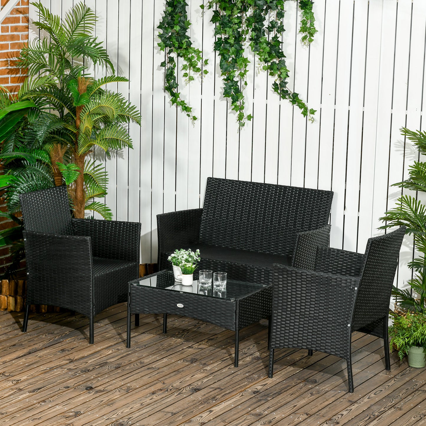 Outsunny Conjunto de Jardim de Vime Sintético Conjunto de 4 Peças Móveis de Jardim com 2 Poltronas 1 Sofá de 2 Lugares 1 Mesa de Centro com Tampo de Vidro e Almofadas Preto e Branco